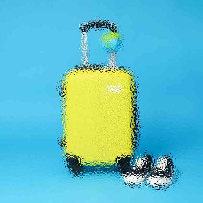 Yellow bottle with a white pump on a bright blue background, accompanied by two white-and-black capsules.
