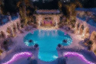 Aerial view of a cross-shaped turquoise pool outlined by pink-purple lighting in a dark indoor water park.