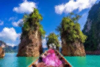 Canoe paddling through turquoise tropical water flanked by tall green limestone islets under a bright blue sky.