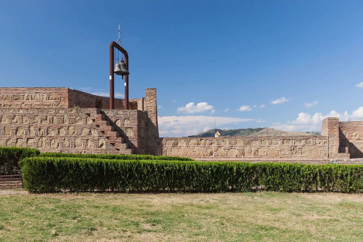 Narikala Fortress walls overlook Tbilisi, the Georgian capital travellers will explore.