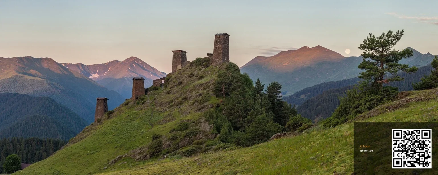 The medieval Keselo fortress towers above Omalo, the iconic silhouette of Tusheti's highland landscape.