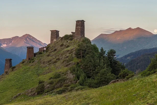 The medieval Keselo fortress towers above Omalo, the iconic silhouette of Tusheti's highland landscape.