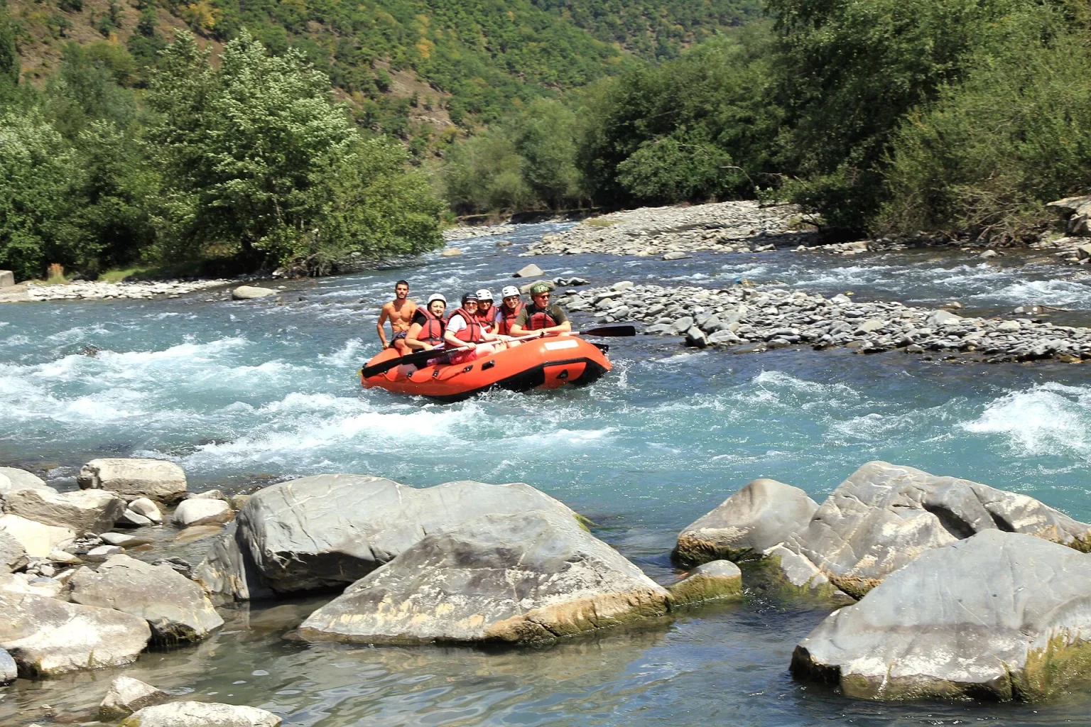 Rafters navigate the Aragvi River near its confluence in central Georgia.