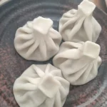 Khinkali, Georgia's iconic dumplings, a dish travellers from Liechtenstein will encounter everywhere.