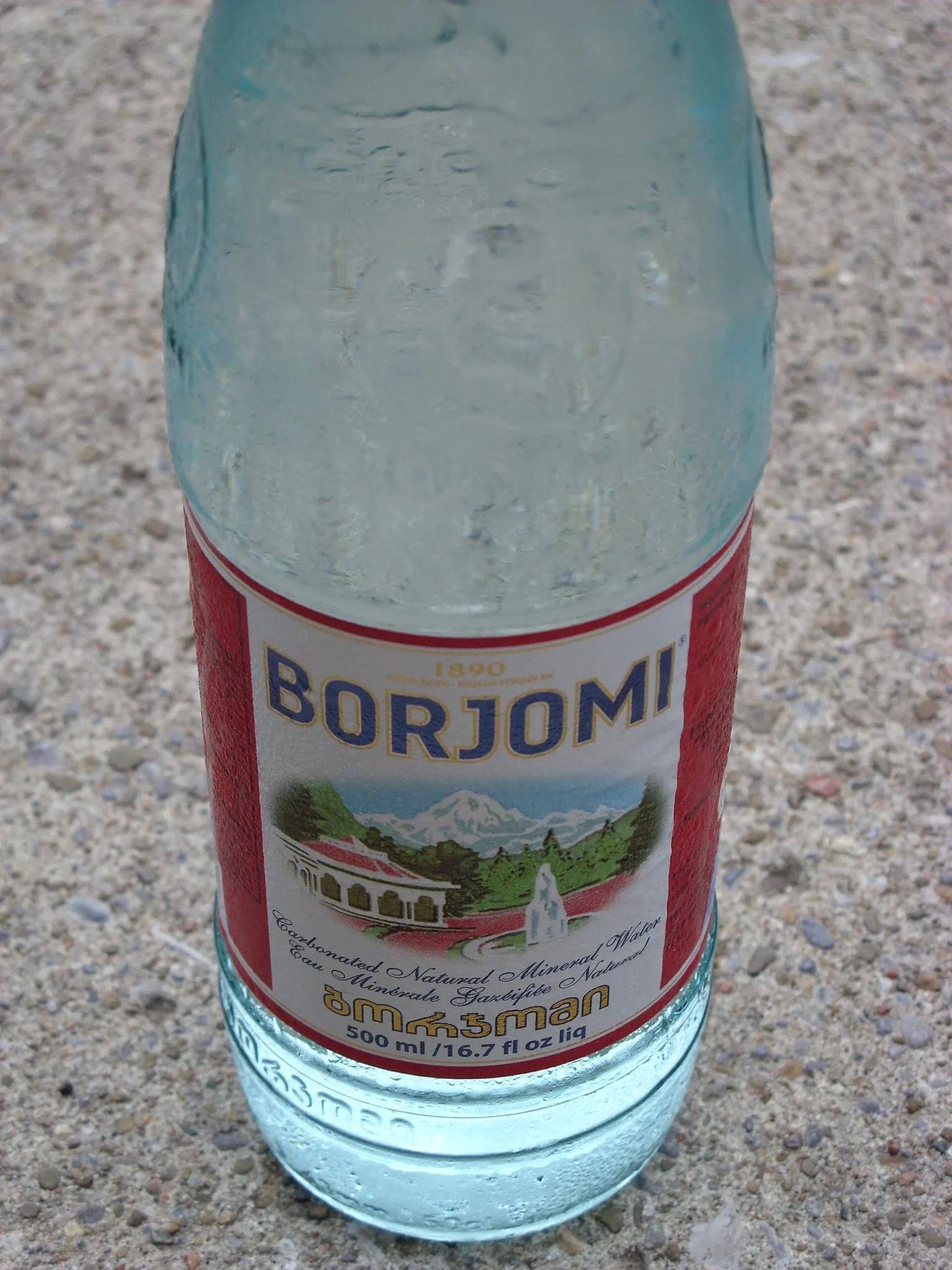 A classic glass bottle of Borjomi mineral water, Georgia's famous naturally carbonated spring water.