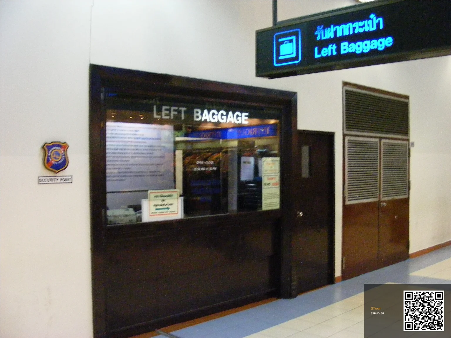 A staffed left-luggage counter, the classic model for airport baggage storage like Tbilisi's.