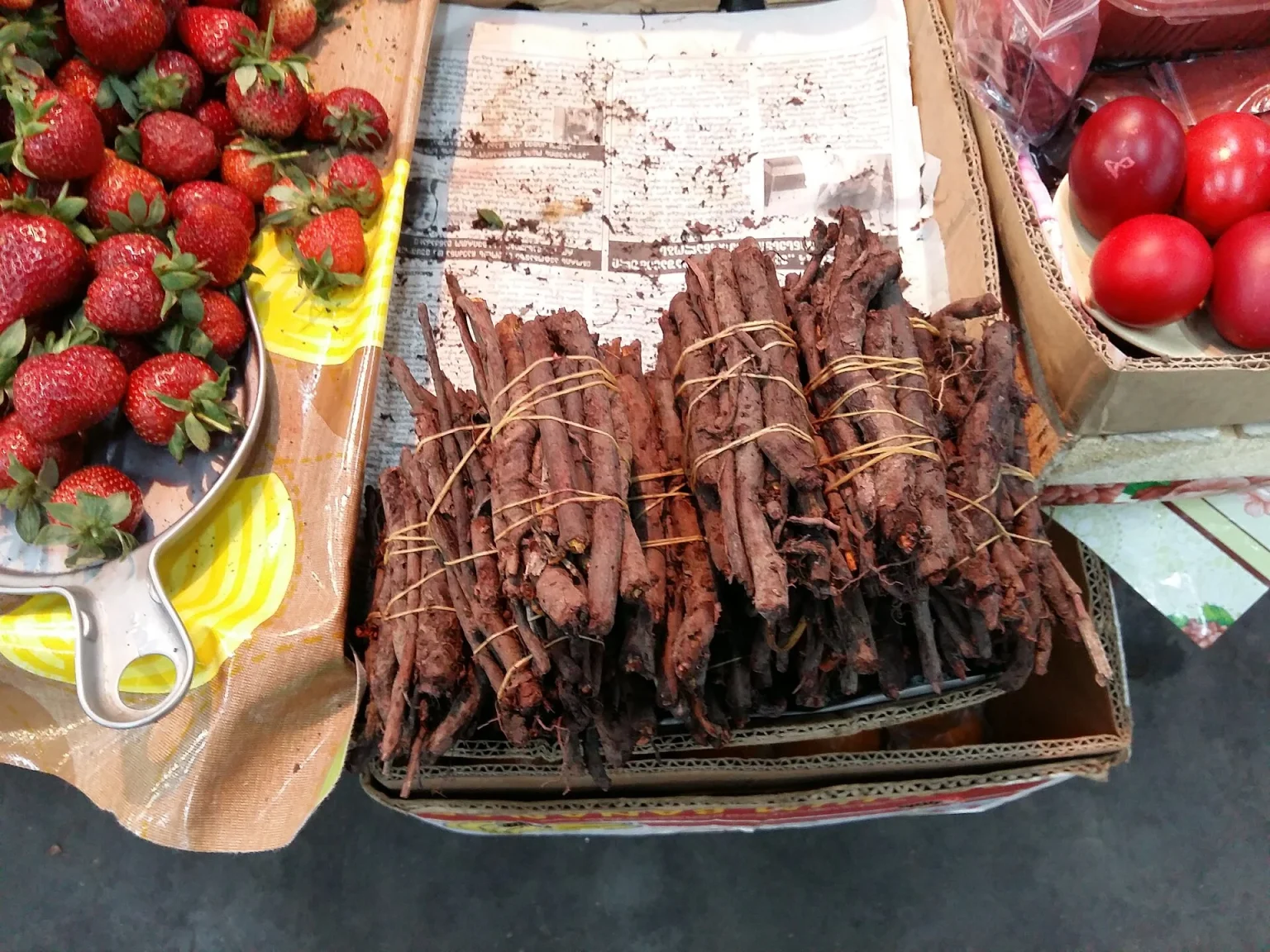 Red-dyed Easter eggs and madder roots used for the traditional Georgian dye at a Tbilisi market.