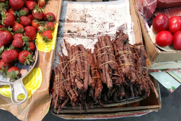 Red-dyed Easter eggs and madder roots used for the traditional Georgian dye at a Tbilisi market.