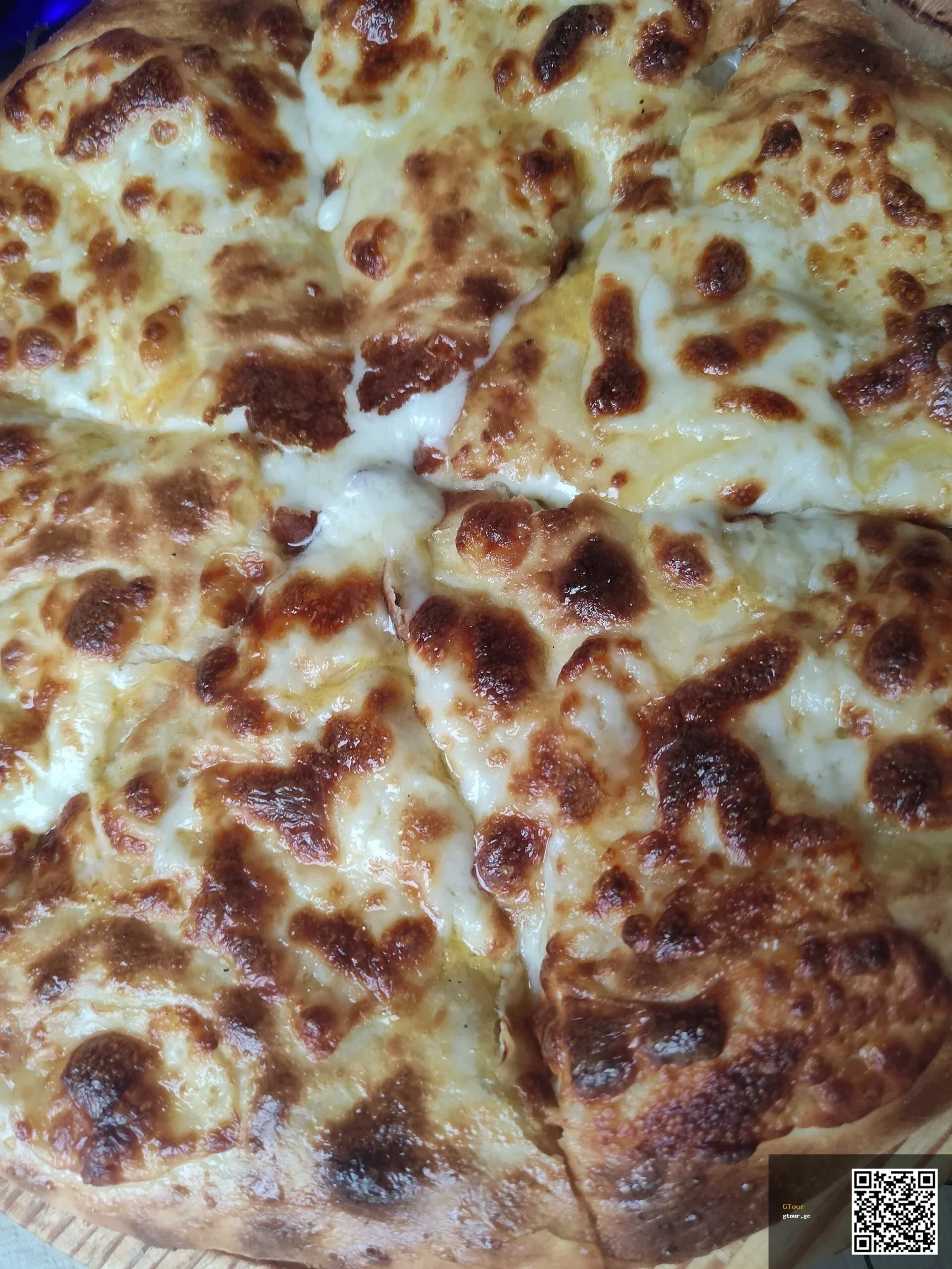 Khachapuri, Georgia's iconic cheese-filled bread, a dish Tanzanian visitors will often encounter.