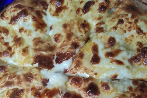 Khachapuri, Georgia's iconic cheese-filled bread, a dish Tanzanian visitors will often encounter.