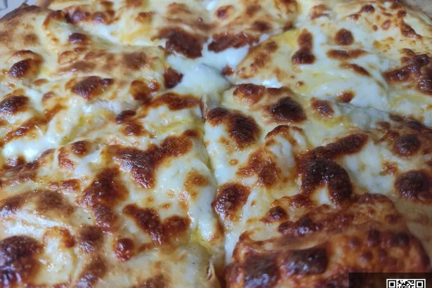 Khachapuri, Georgia's iconic cheese-filled bread, a dish Gambian visitors will encounter everywhere.