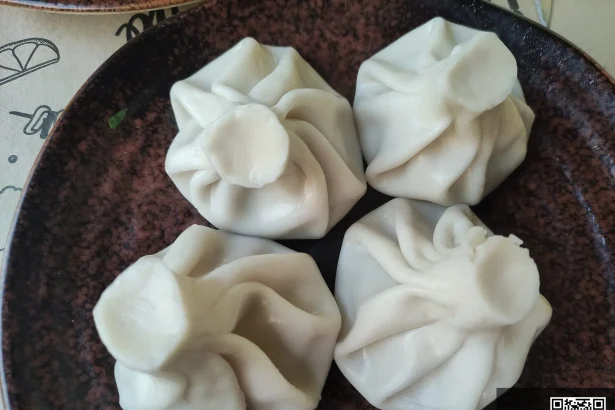 Khinkali, Georgia's iconic dumpling, a familiar comfort food for Maldivian visitors.