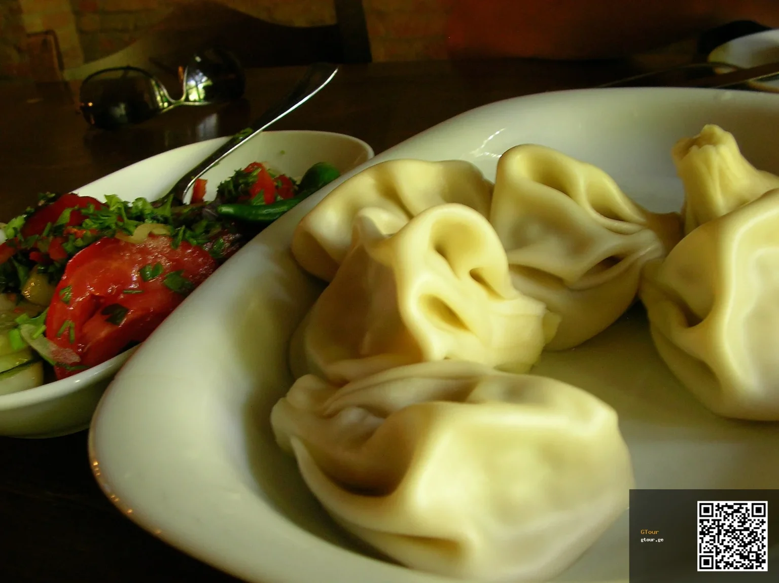 A plate of khinkali, Georgia's signature dumplings, a dish every UK visitor should try.
