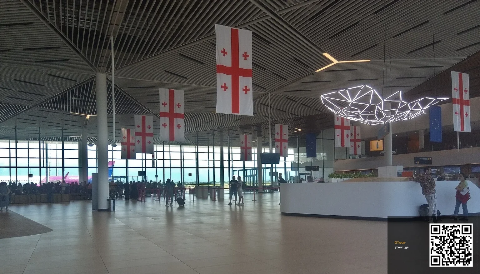 The departure hall of Kutaisi International Airport, where arriving passengers meet buses, taxis and transfers.