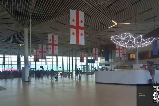The departure hall of Kutaisi International Airport, where arriving passengers meet buses, taxis and transfers.