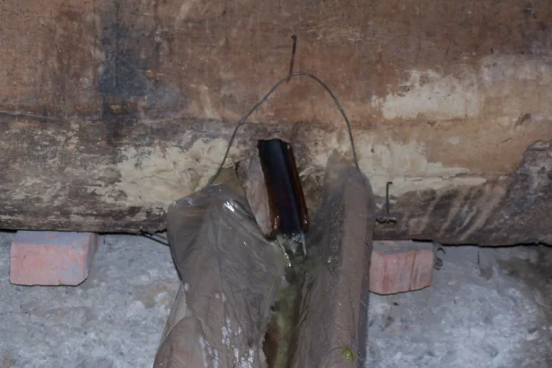 Grape must drains through a traditional cloth filter during Kakheti's autumn Rtveli wine harvest.