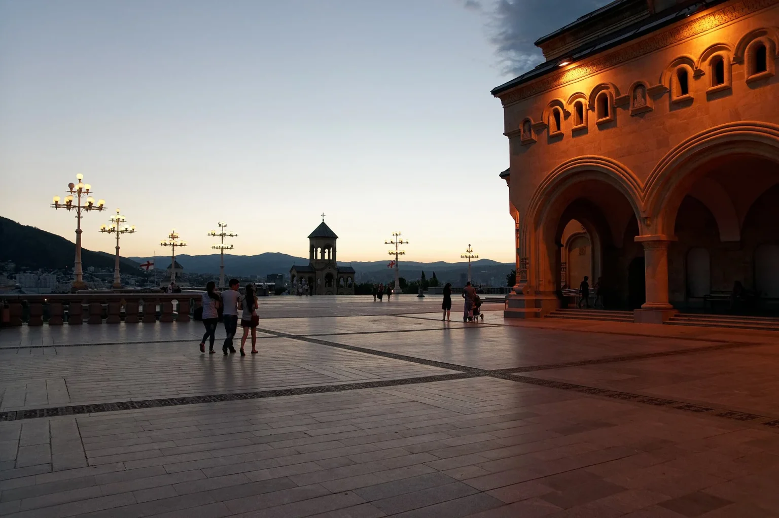 Sameba Cathedral courtyard at dusk, Tbilisi's most recognisable landmark for visitors.