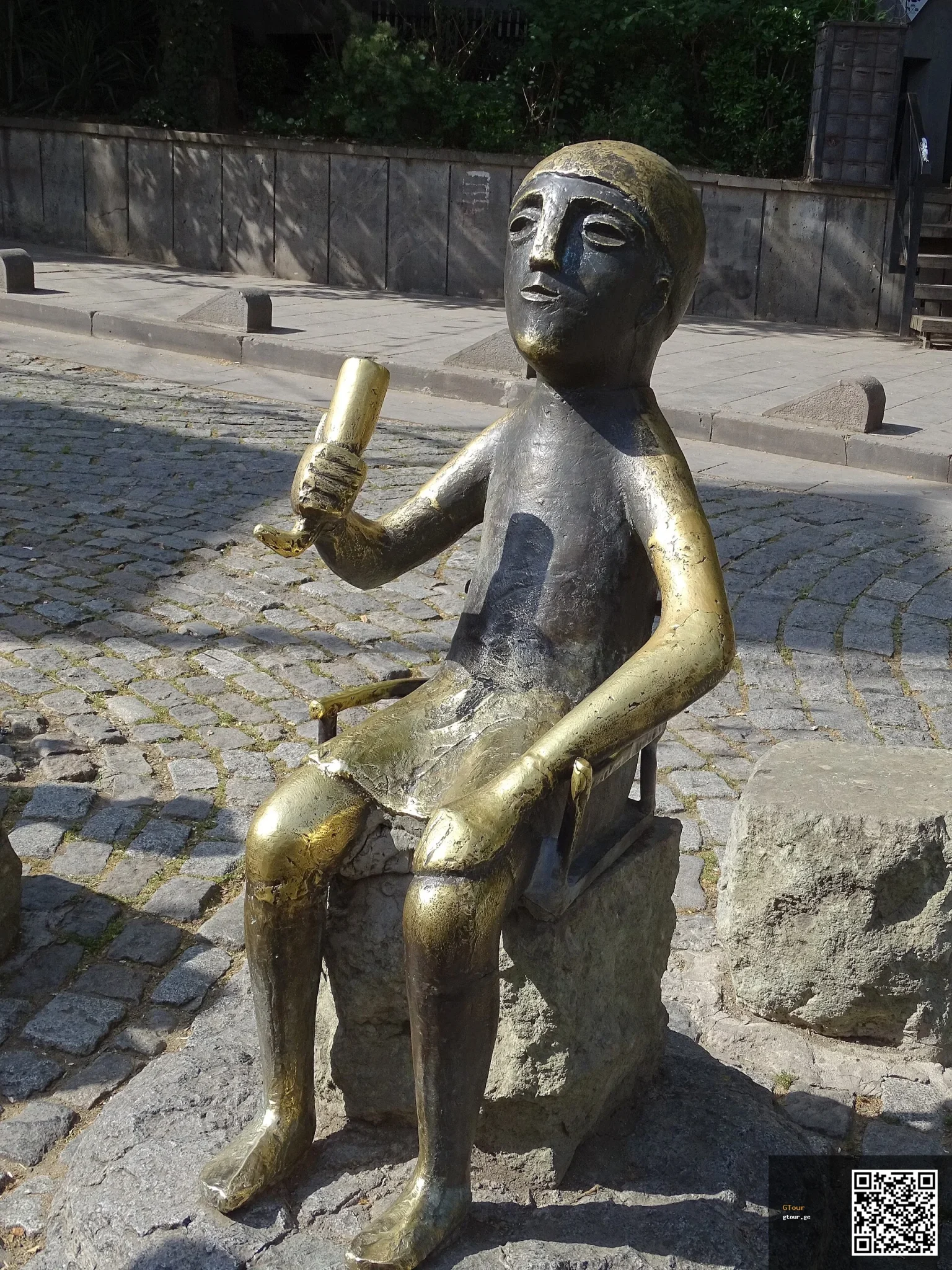 The Tamada toastmaster statue in Tbilisi symbolises Georgia's wine-toasting feast culture travellers will encounter.