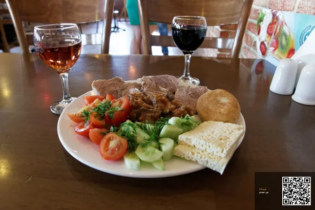 A typical restaurant meal with wine served in Tbilisi, Georgia.