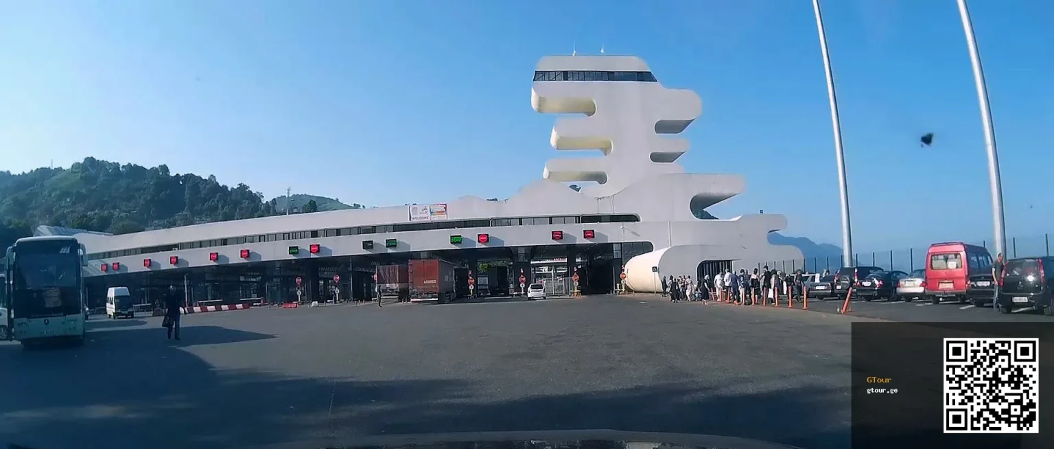 Buses, vans and taxis queue at the Sarpi border checkpoint used by passengers transferring to and from Batumi airport.