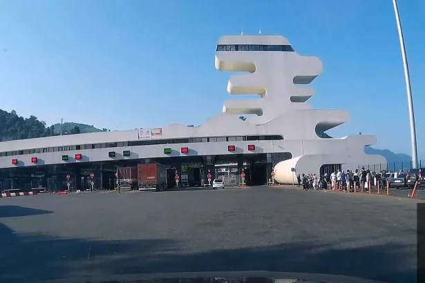 Buses, vans and taxis queue at the Sarpi border checkpoint used by passengers transferring to and from Batumi airport.