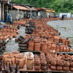 Rows of traditional clay pottery for sale at the Shrosha pottery market near Tbilisi.
