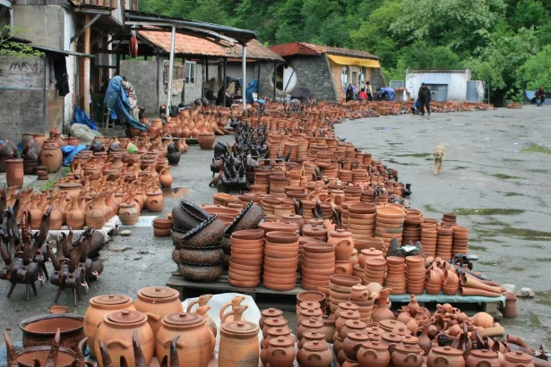 Rows of traditional clay pottery for sale at the Shrosha pottery market near Tbilisi.