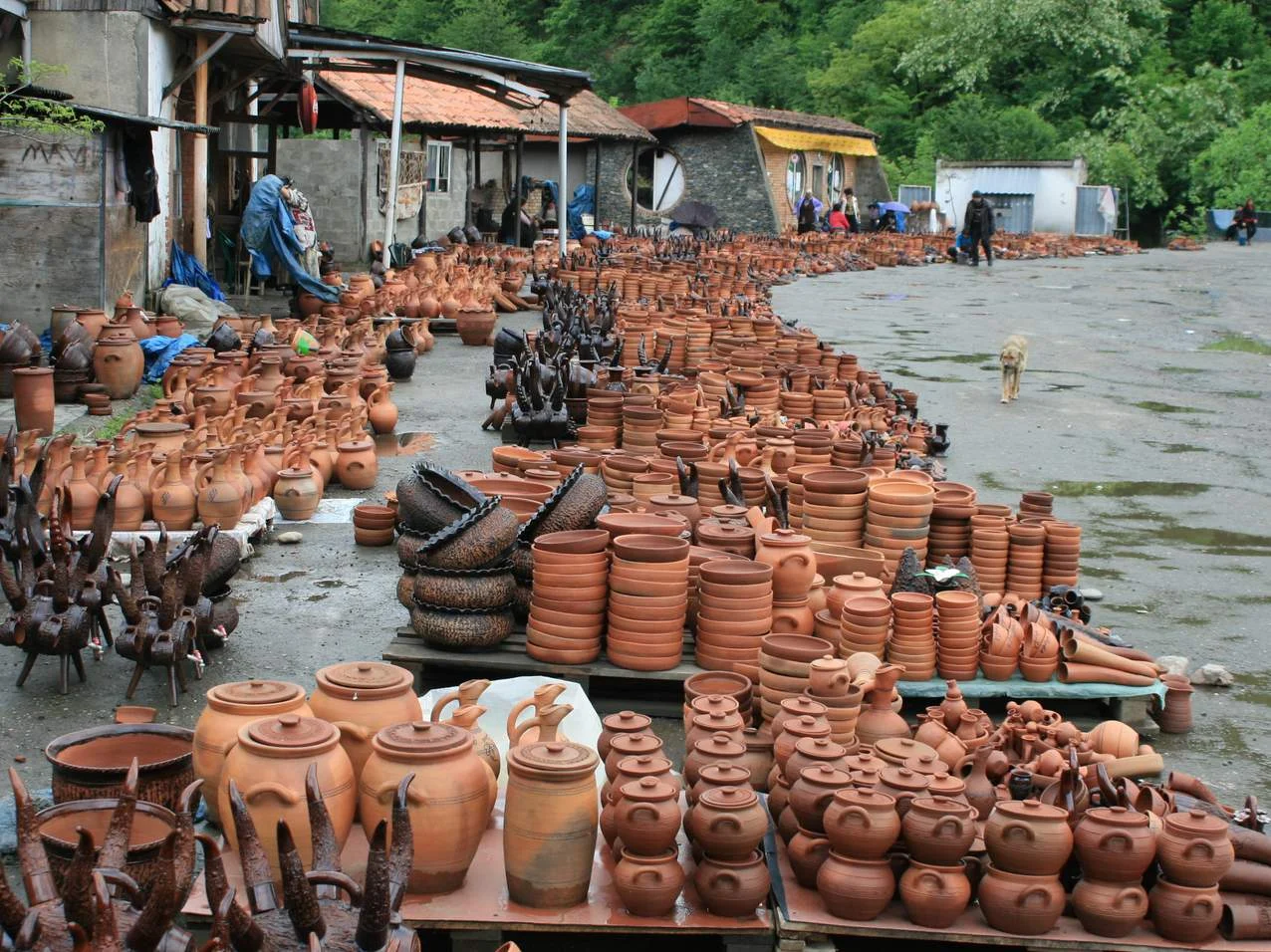 Rows of traditional clay pottery for sale at the Shrosha pottery market near Tbilisi.